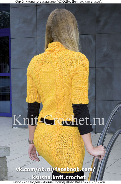 Женский удлиненный пуловер размера 44-46, связанный на спицах.
