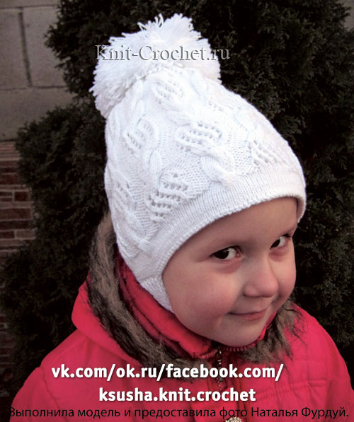 Зимняя теплая шапочка для девочки размера 52.