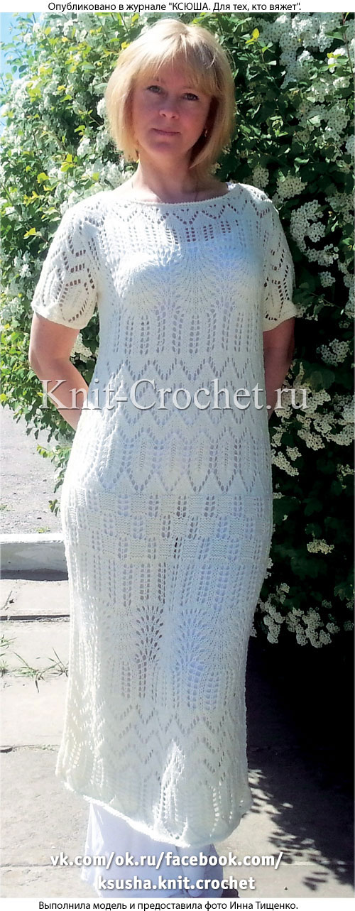Связанное на спицах женское платье-туника 46-48 размера.