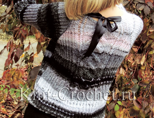 Женский пуловер реглан размера 42-44, связанный на спицах.